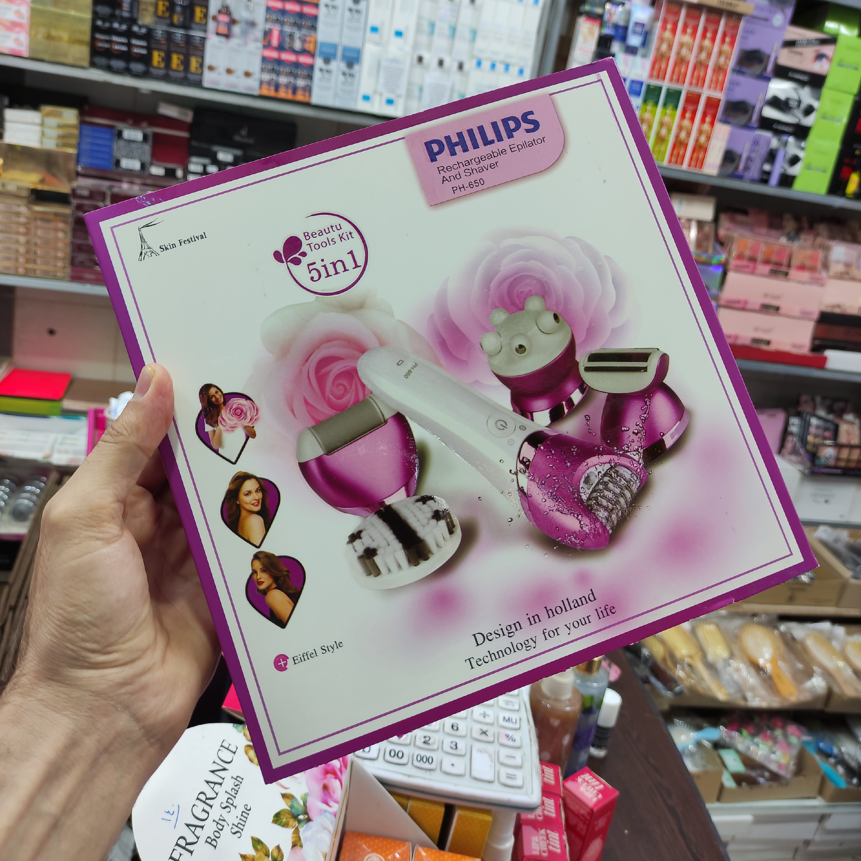 اپلیدی 5 کاره فیلیپس هلند مدل PH 650- دارای سری سرامیکی با روکش میکرو 72 موچین حرفه ای همراه با سنگ پا و ماساژور صورت